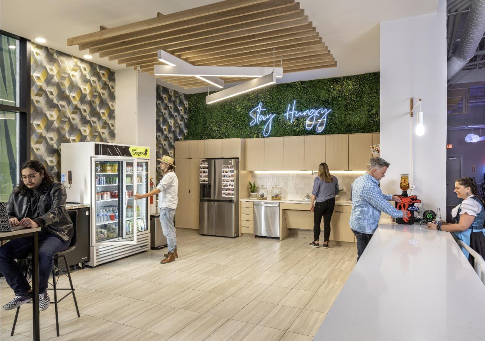 studio area with vending machines and grass walls